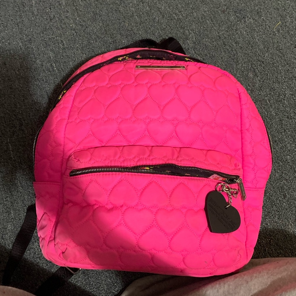 Pink backpack, rose print in inside, perfect quality.